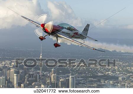 Extra Aircraft Extra 300 in flight over Auckland View Large Photo Image Stock Image - Extra Aircraft Extra 300 in flight over Auckland. Fotosearch