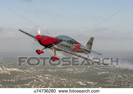 Extra Aircraft Extra 300 in flight over Auckland View Large Photo Image Stock Image - Extra Aircraft Extra 300 in flight over Auckland. Fotosearch