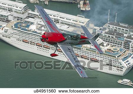 Extra Aircraft Extra 300 in flight over Auckland Harbour View Large Photo Image Stock Image - Extra Aircraft Extra 300 in flight over Auckland Harbour. Fotosearch