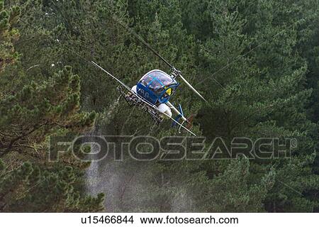 Picture - Flight conducting aerial spraying. Fotosearch