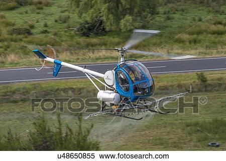 Flight conducting aerial spraying View Large Photo Image Stock Photography - Flight conducting aerial spraying. Fotosearch