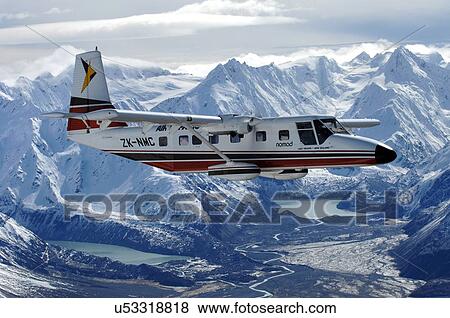 Flight over mountains near Lake Tekapo View Large Photo Image Stock Photo - Flight over mountains near Lake Tekapo. Fotosearch