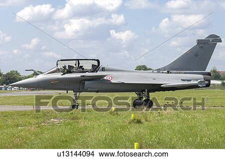 Picture - French Air Force Dassault Rafale prepares for takeoff at Paris Air Show. Fotosearch