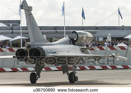 Stock Image - French Air Force Dassault Rafale prepares for takeoff at Paris Air Show. Fotosearch