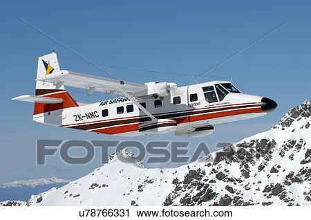 GAF Nomad in flight near Lake Tekapo View Large Photo Image Stock Image - GAF Nomad in flight near Lake Tekapo. Fotosearch