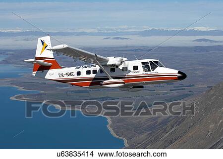 Picture - GAF Nomad over Lake Tekapo. Fotosearch