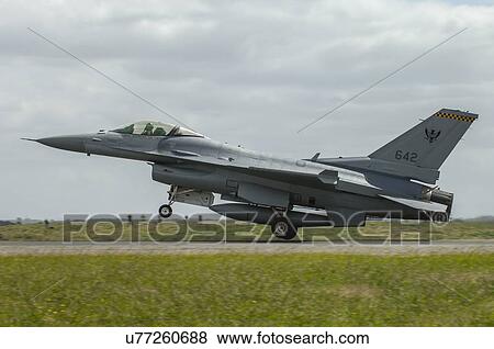 Stock Photo - General Dynamics F-16C Fighting Falcon lands at Avalon Airport during Australian Bicentennial Air Show. Fotosearch