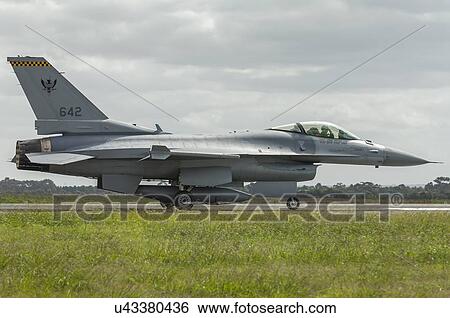 Stock Photograph - General Dynamics F-16C Fighting Falcon taxis at Avalon Airport during Australian Bicentennial Air Show. Fotosearch