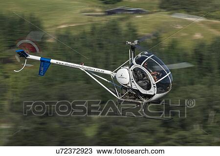 Hughes 269C blurred motion View Large Photo Image Stock Image - Hughes 269C blurred motion . Fotosearch