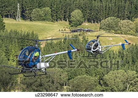 Hughes 269C in flight View Large Photo Image Stock Photo - Hughes 269C in flight. Fotosearch