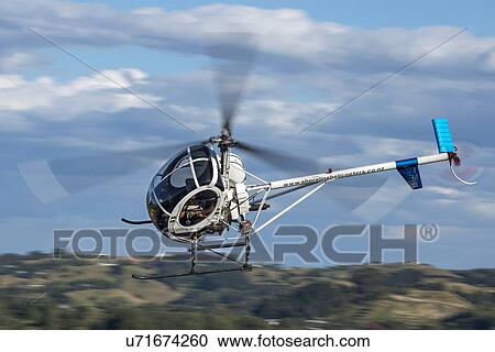 Stock Image - Hughes 269C turning . Fotosearch