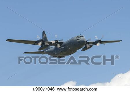 Stock Photograph - Lockheed C-130H Hercules of the Royal New Zealand Air Force during a display over Whenuapai Air Base. Fotosearch