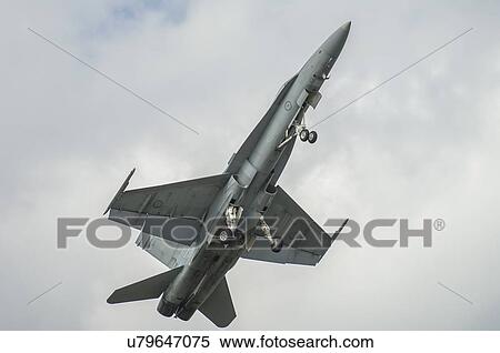 Stock Photography - McDonnell Douglas F/A-18A Hornet flying at Whenuapai Air Base. Fotosearch