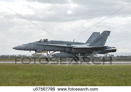 Stock Photo - McDonnell Douglas F/A-18A Hornet takes off . Fotosearch