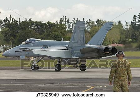 Stock Photo - McDonnell Douglas F/A-18A Hornet taxis in after its flying display at Whenuapai Air Base. Fotosearch
