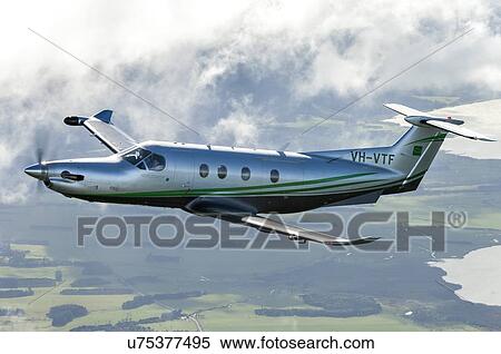 Pilatus PC12 in flight near Wellington View Large Photo Image Stock Photography - Pilatus PC12 in flight near Wellington. Fotosearch