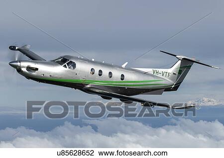 Stock Image - Pilatus PC12NG in flight near Wellington. Fotosearch