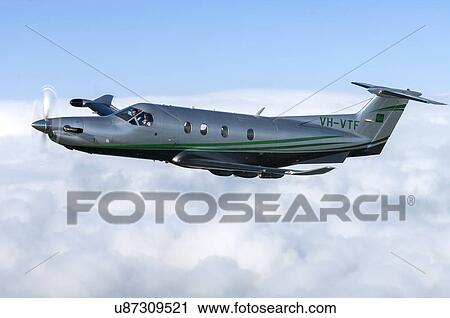 Stock Image - Pilatus PC12NG in flight near Wellington. Fotosearch