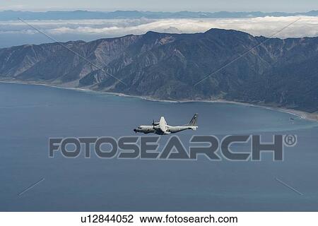 Portuguese Air Force C295 in flight over coast near Wellington, New Zealand View Large Photo Image Stock Image - Portuguese Air Force C295 in flight over coast near Wellington, New Zealand. Fotosearch