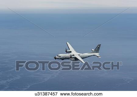 Stock Photo - Portuguese Air Force C295 in flight near Wellington, New Zealand. Fotosearch