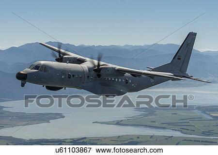 Stock Photo - Portuguese Air Force C295 in flight over Lake Wairarapa. Fotosearch