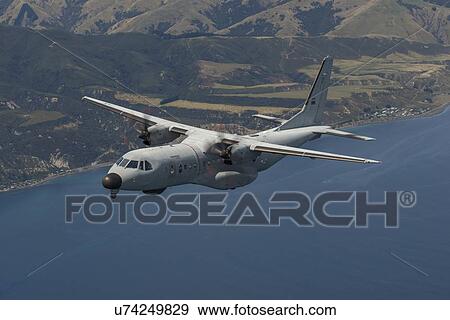 Portuguese Air Force C295 in flight over coast near Wellington, New Zealand View Large Photo Image Stock Photo - Portuguese Air Force C295 in flight over coast near Wellington, New Zealand. Fotosearch