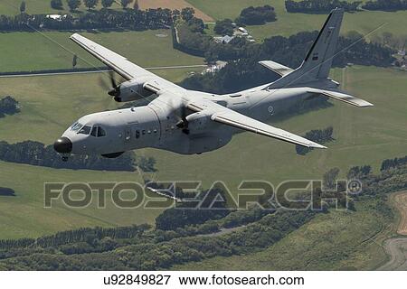 Portuguese Air Force C295 in flight over farmland near Wellington, New Zealand View Large Photo Image Stock Photo - Portuguese Air Force C295 in flight over farmland near Wellington, New Zealand. Fotosearch