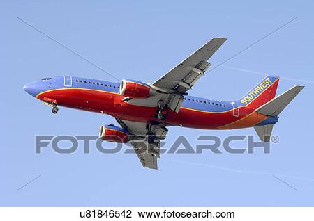 Stock Image - Southwest Airlines Boeing 737-300 landing at Los Angeles International Airport. Fotosearch