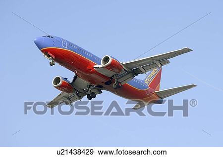 Stock Photo - Southwest Airlines Boeing 737-300 landing at Los Angeles International Airport. Fotosearch