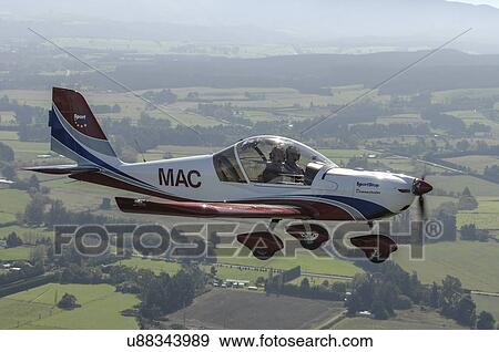 SportStar Max light aircraft in flight View Large Photo Image Stock Photo - SportStar Max light aircraft in flight . Fotosearch