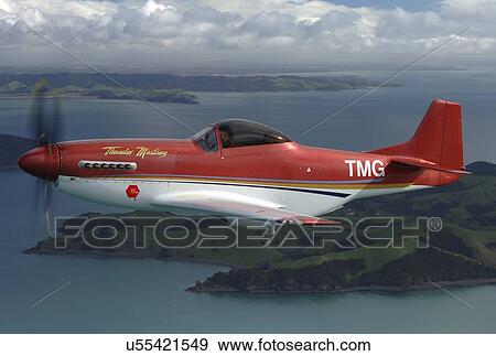 Stock Photo - Thunder Mustang in flight near Auckland. Fotosearch
