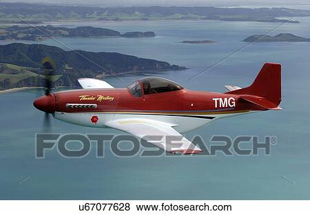 Stock Photo - Thunder Mustang in flight near Auckland. Fotosearch