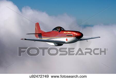 Thunder Mustang in flight near Auckland View Large Photo Image Stock Photo - Thunder Mustang in flight near Auckland. Fotosearch