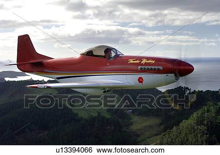 Thunder Mustang in flight near Auckland View Large Photo Image Stock Photograph - Thunder Mustang in flight near Auckland. Fotosearch