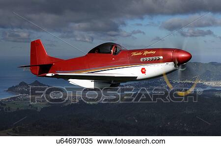 Thunder Mustang in flight near Auckland View Large Photo Image Stock Photography - Thunder Mustang in flight near Auckland. Fotosearch
