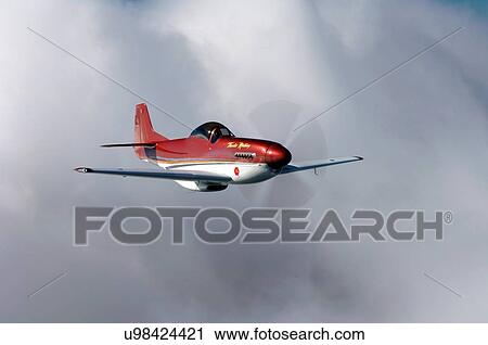 Stock Image - Thunder Mustang in flight near Auckland, New Zealand. Fotosearch