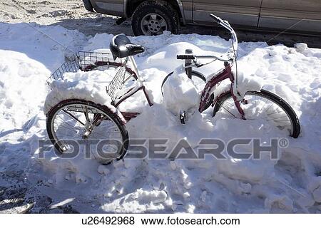 Three wheel bike in snow View Large Photo Image Stock Photo - Three wheel bike in snow. Fotosearch