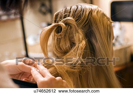 Stock Image - At the hair salon. Fotosearch