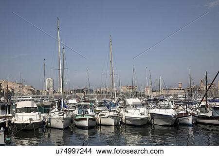 Boats in a row View Large Photo Image Picture - Boats in a row. Fotosearch