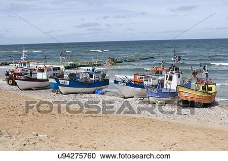 Stock Image - Boats on beach. Fotosearch