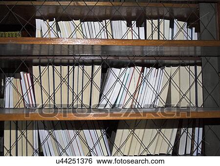 Books on shelves View Large Photo Image Stock Photograph - Books on shelves. Fotosearch