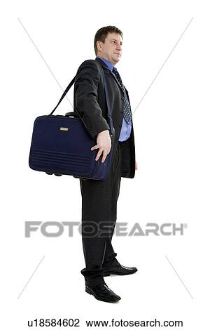 Business man carrying briefcase View Large Photo Image Stock Image - Business man carrying briefcase. Fotosearch
