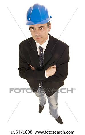 Business man in hard hat View Large Photo Image Stock Photo - Business man in hard hat. Fotosearch