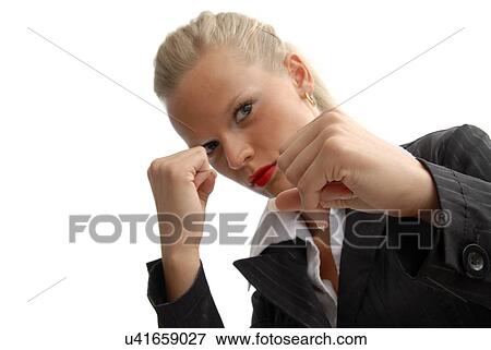 Stock Photo - Business woman with fists up. Fotosearch