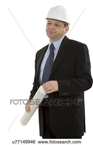 Businessman with hard hat and construction plans View Large Photo Image Stock Photograph - Businessman with hard hat and construction plans. Fotosearch