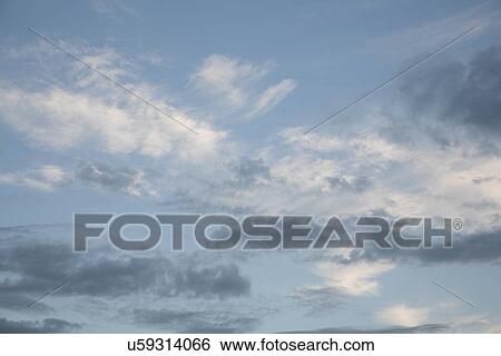 Stock Photograph - Clouds in the sky. Fotosearch