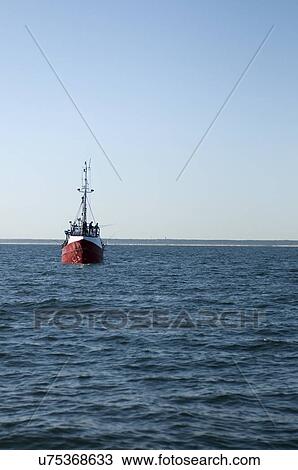 Fishing boat at sea View Large Photo Image Stock Image - Fishing boat at sea. Fotosearch