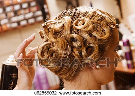 Getting hair done View Large Photo Image Stock Image - Getting hair done. Fotosearch