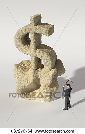 Picture - Man chiseling dollar sign out of stone. Fotosearch