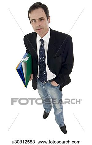Man in suit coat and jeans carrying folders View Large Photo Image Stock Image - Man in suit coat and jeans carrying folders. Fotosearch